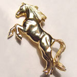 14 kt. yellow gold rearing horse brooch with diamond eye