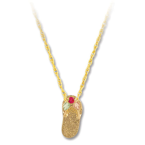 Landstrom's Black Hills Gold sandal and syntetic ruby necklace