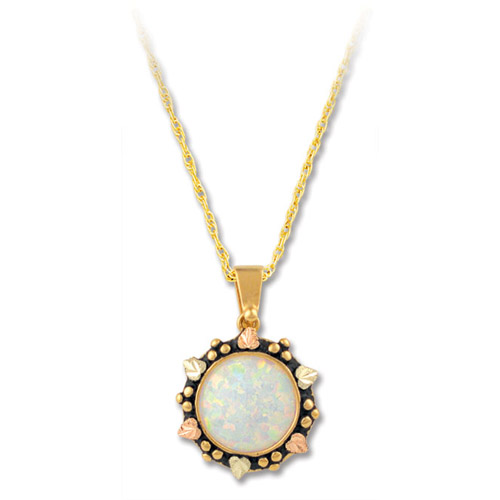 Landstrom's Black Hills Gold circular Opal necklace