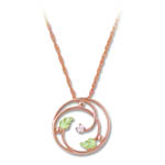 Landstrom's Black Hills Gold Rose Gold circular diamond necklace