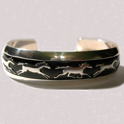 Sterling Silver galloping and trotting horses cuff bracelet with antiquing