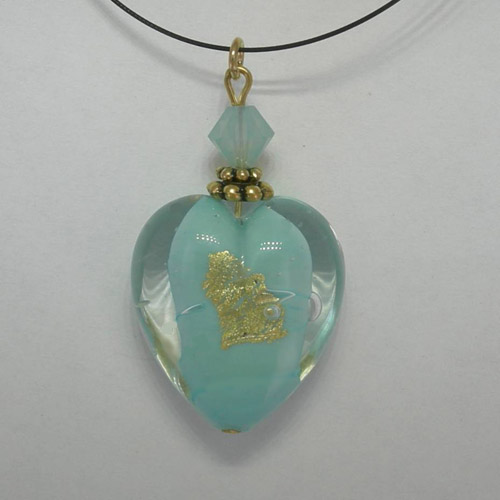 back side of Venetian Glass Clear and Blue Pacific Opal heart on nylon cord
