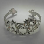Top view of Landstroms filigree galloping horse bracelet