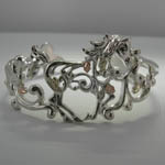 Landstroms Black Hills Gold Sterling Silver filigree galloping horse bracel