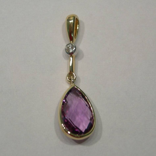 14 karat yellow gold Amethyst and diamond pendant