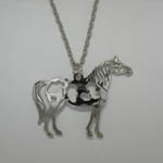 Close up of Pinto Horse pendant of necklace