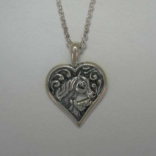 Sterling Silver mare and foal horse heads in heart necklace