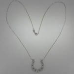 Custom 14 karat white gold horse shoe necklace