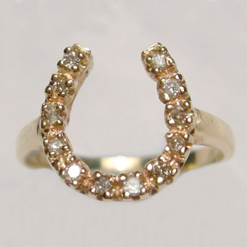 14 kt. y.g. diamond horseshoe ring
