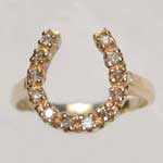 14 kt. y.g. diamond horseshoe ring