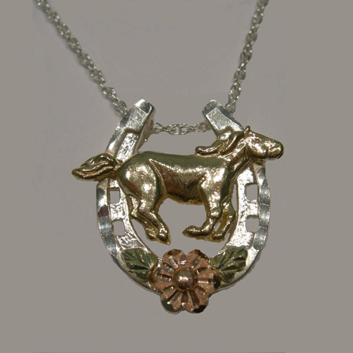 Landstrom's Black Hills Gold Sterling Silver horseshoe and horse necklace
