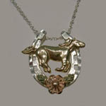 Landstrom's Black Hills Gold Sterling Silver horseshoe and horse necklace