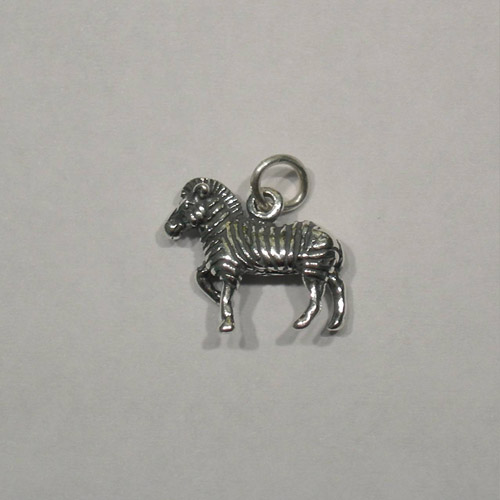 left side of 3 D trotting Zebra charm/pendant