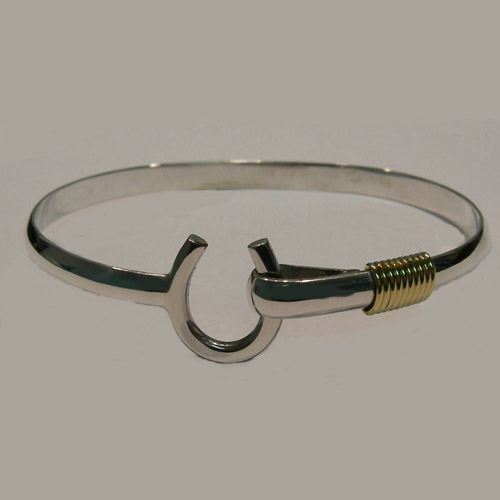 Sterling Silver and goldtone horseshoe bangle bracelet