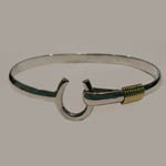 Sterling Silver and goldtone horseshoe bangle bracelet