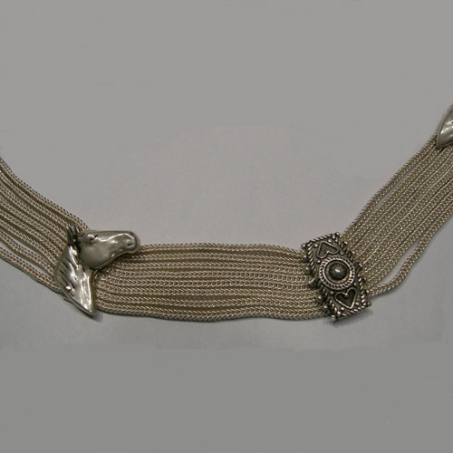 Close up of Sterling Silver horsehead collar necklace