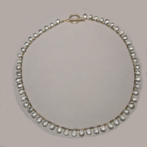 14 kt.y.g. plated White Topaz bead necklace