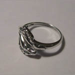 side of Sterling Silver double horsehead ring