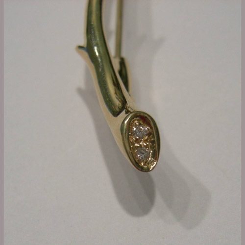 close up of diamonds in rose brooch