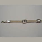 Close up of lobster claw and link of link horse bracelet