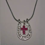 Sterling Silver ruby cross inside horseshoe necklace