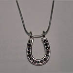 Sterling Silver sapphire horseshoe necklace