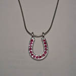 Sterling Silver ruby horseshoe necklace