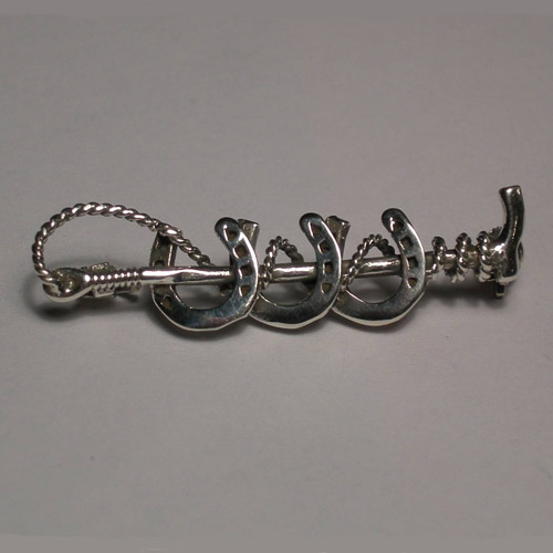 Sterling Silver horseshoes and crop brooch