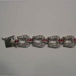 Clasp side of ruby and Cubic Zirconia horseshoe bracelet