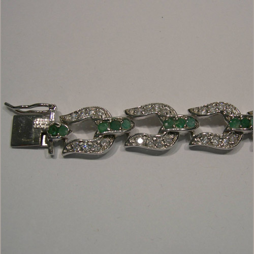 Tongue clasp of emerald and Cubic Zirconia horseshoe bracelet