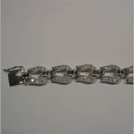 Tongue clasp of sapphire and Cubic Zirconia horseshoe bracelet