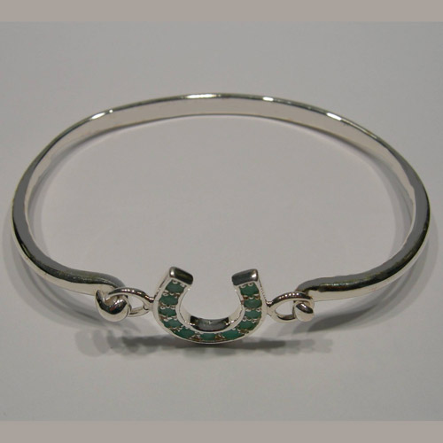 side view of emerald horseshoe bangle bracelet