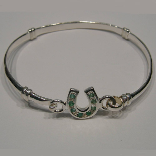 side view of childs emerald horseshoe bangle bracelet