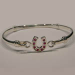 Sterling Silver childs ruby horseshoe bangle bracelet