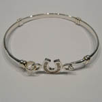 side view of childs Cubic Zirconia horseshoe bangle bracelet