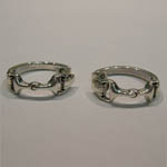 side view of snaffle bit hoop earrings