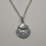 Sterling Silver horse silhouette inside disc necklace