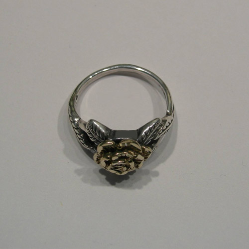 Top view of silver and gold rose ring