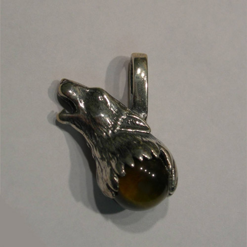 Left side of Sterling Silver Wolf Head Tigers Eye Quartz Pendant