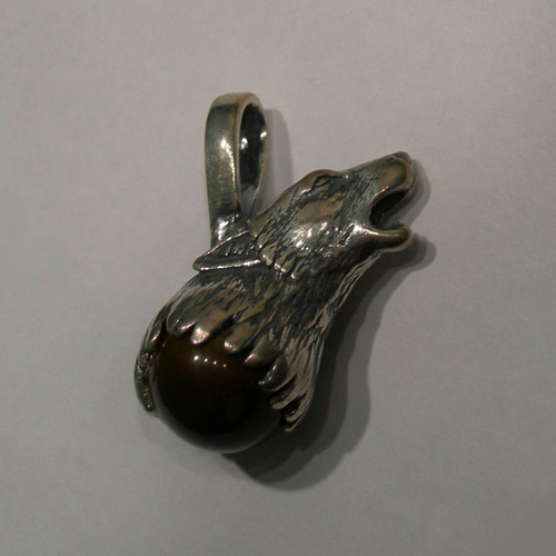 Right side of Sterling Silver Wolf Head Tigers Eye Quartz Pendant
