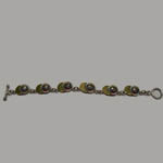 Sterling Silver and goldtone jockey's cap link bracelet