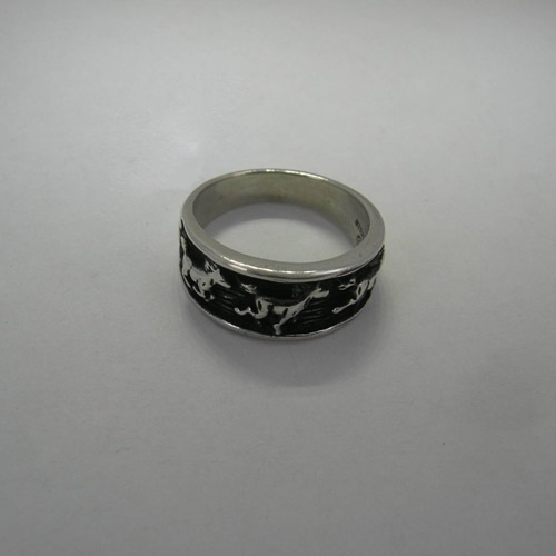 side view of antiqued galloping horses ring