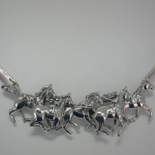 close up of Arabian horse herd in necklace