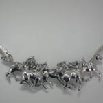 close up of Arabian horse herd in necklace