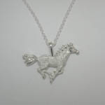 Sterling Silver pave galloping horse necklace