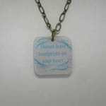 back of two horses necklace