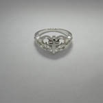 side view of filigree cross ring